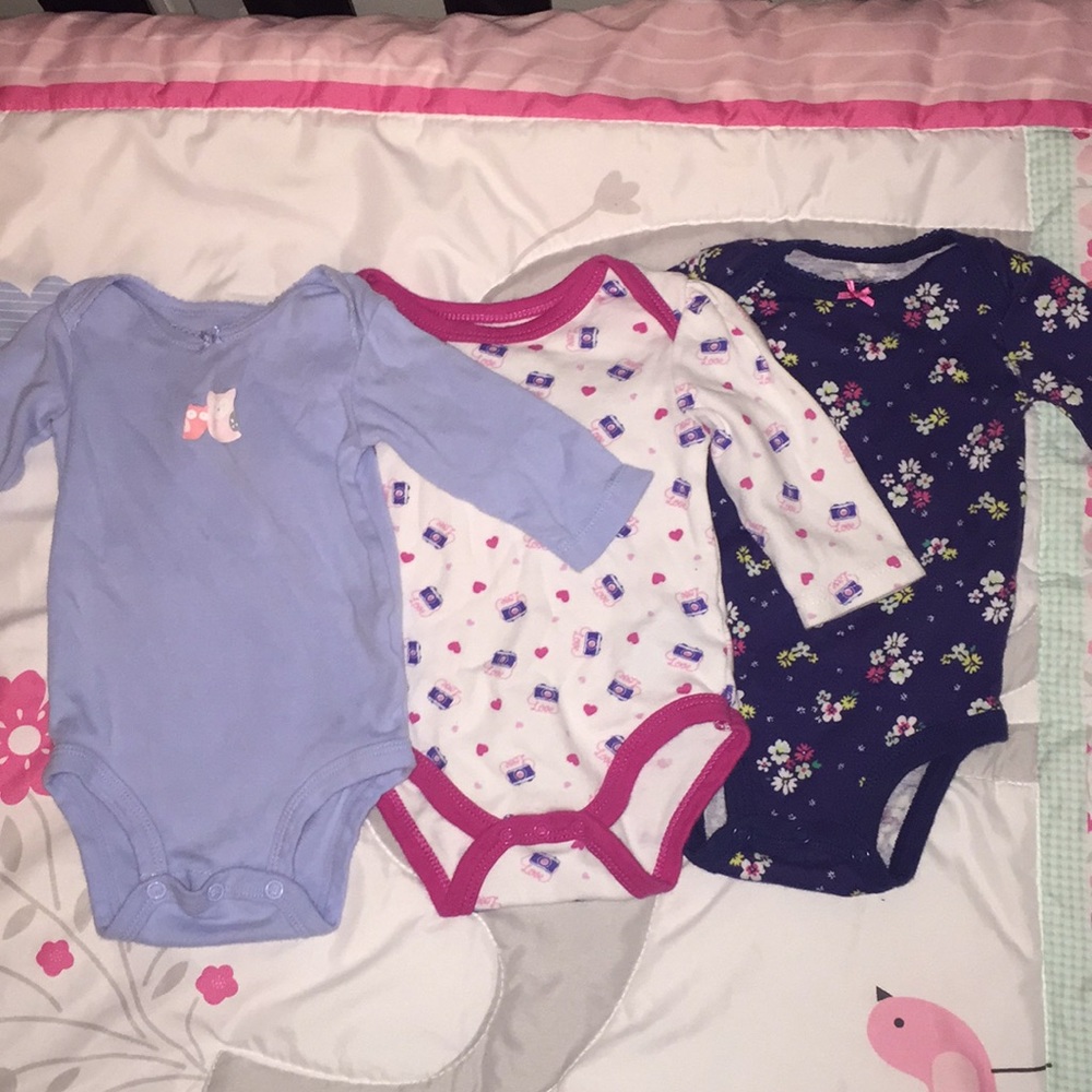 Three long sleeve onesies